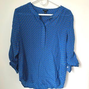 Blue silk long sleeved patterned blouse by Ann Taylor. Size S.